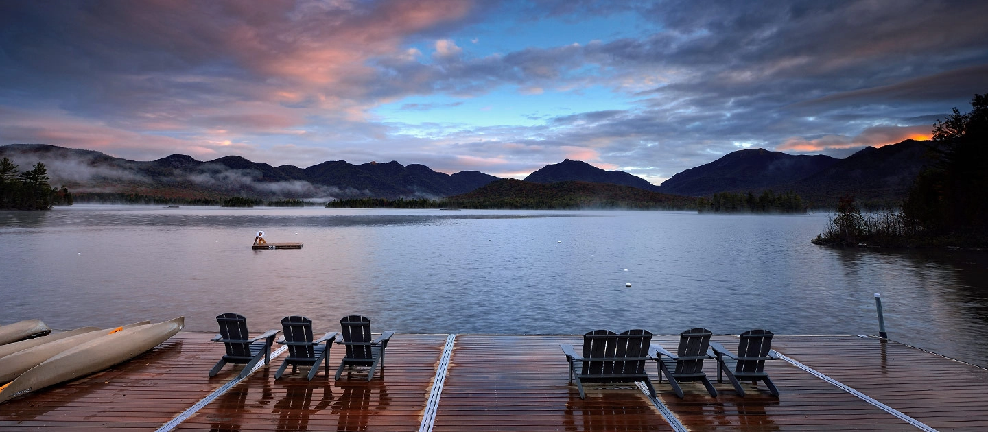 Sunset view of the high peaks from Elk Lake Lodge docks