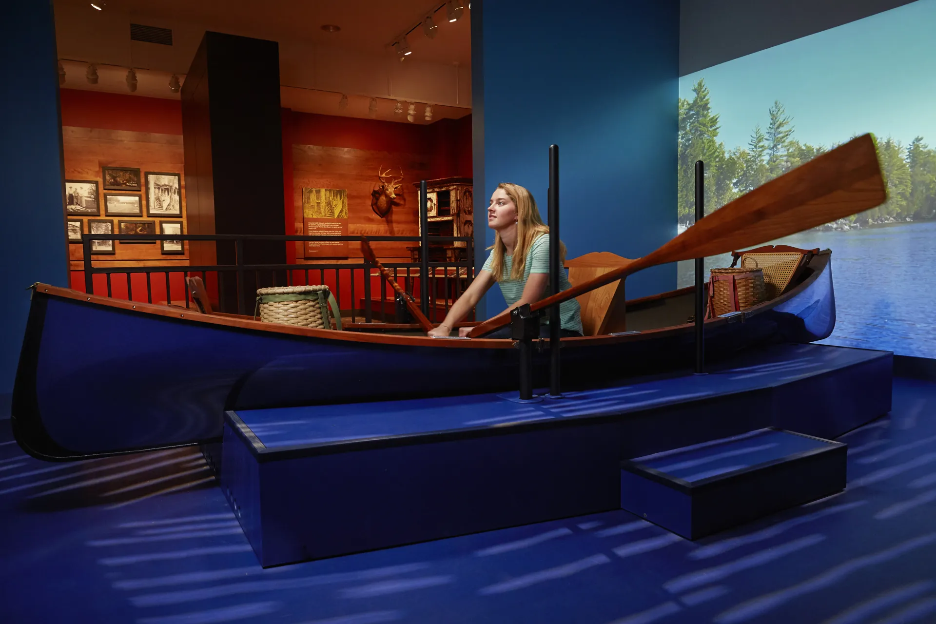 A woman rows a display boat