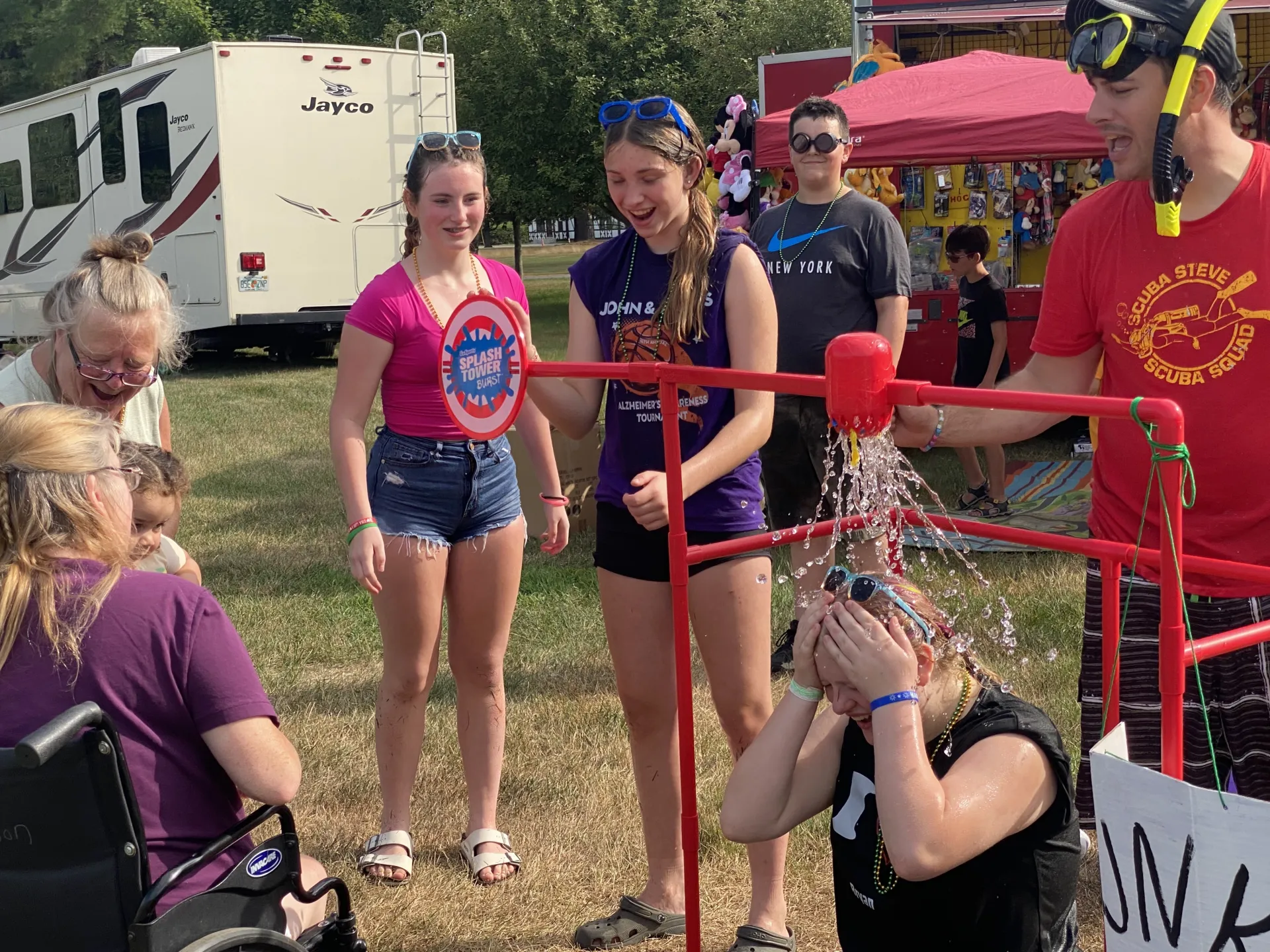 teens getting dunked at etown day festival
