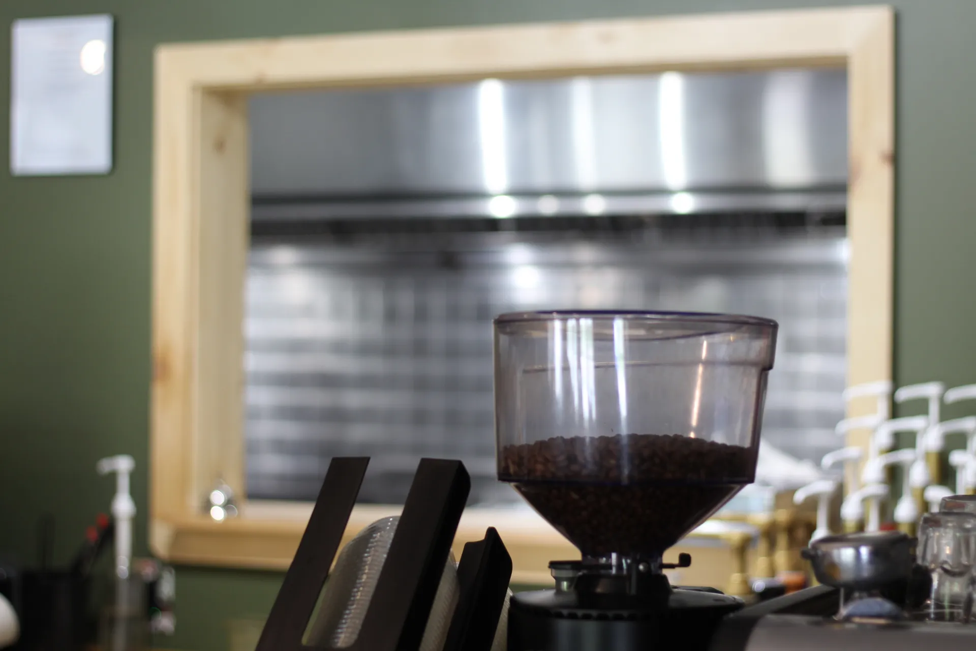The coffee grinder with an array of flavorings for the specialty coffees.