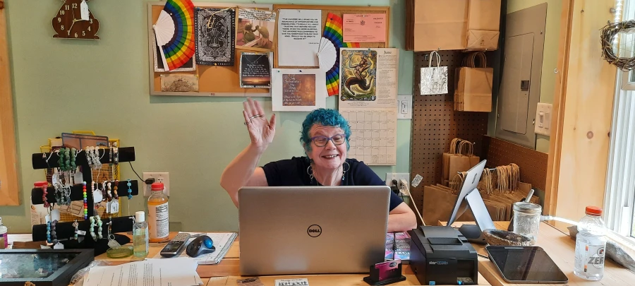 Susan behind the desk