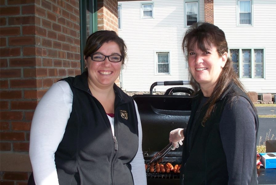 Ladies putting on a BBQ for the bank
